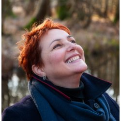 EN FIN SOMMERDAG UNDER DE GRNNE BLADE